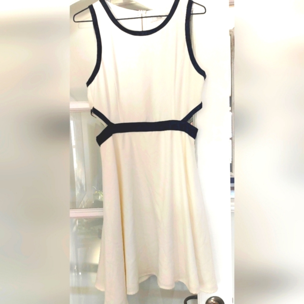 Beautiful White and Black Sleeveless Dress With Waist Cutouts